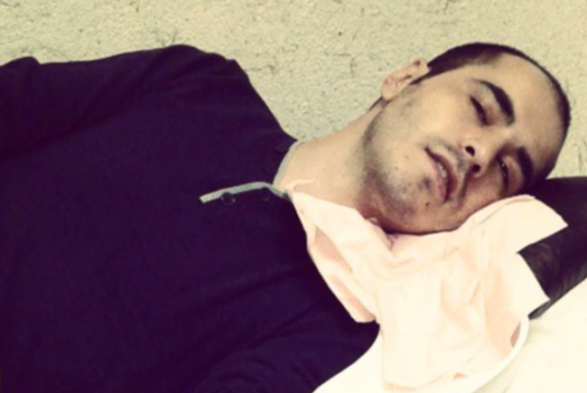 انتقال حسین رونقی به بیمارستان؛ ماموران در مقابل بیمارستان دی به سوی مردم تیراندازی کردند