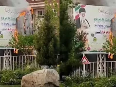 آتش زدن پوستر علی خامنه‌ای مقابل یک مدرسه در قم